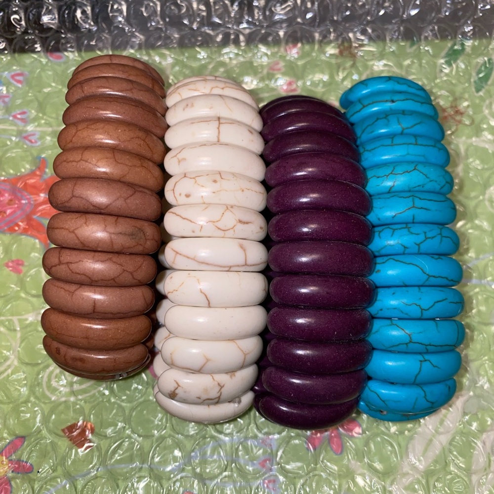 Four like new bracelets